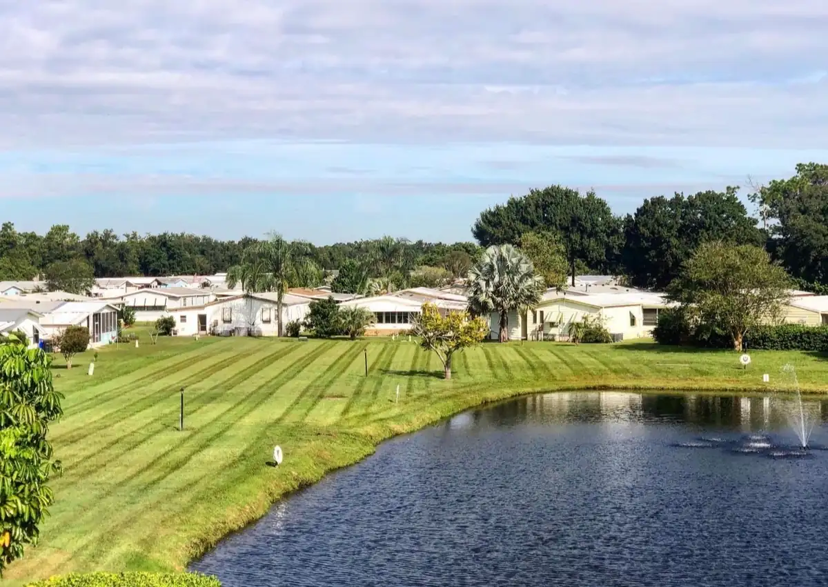 Striped common grounds around a community pond